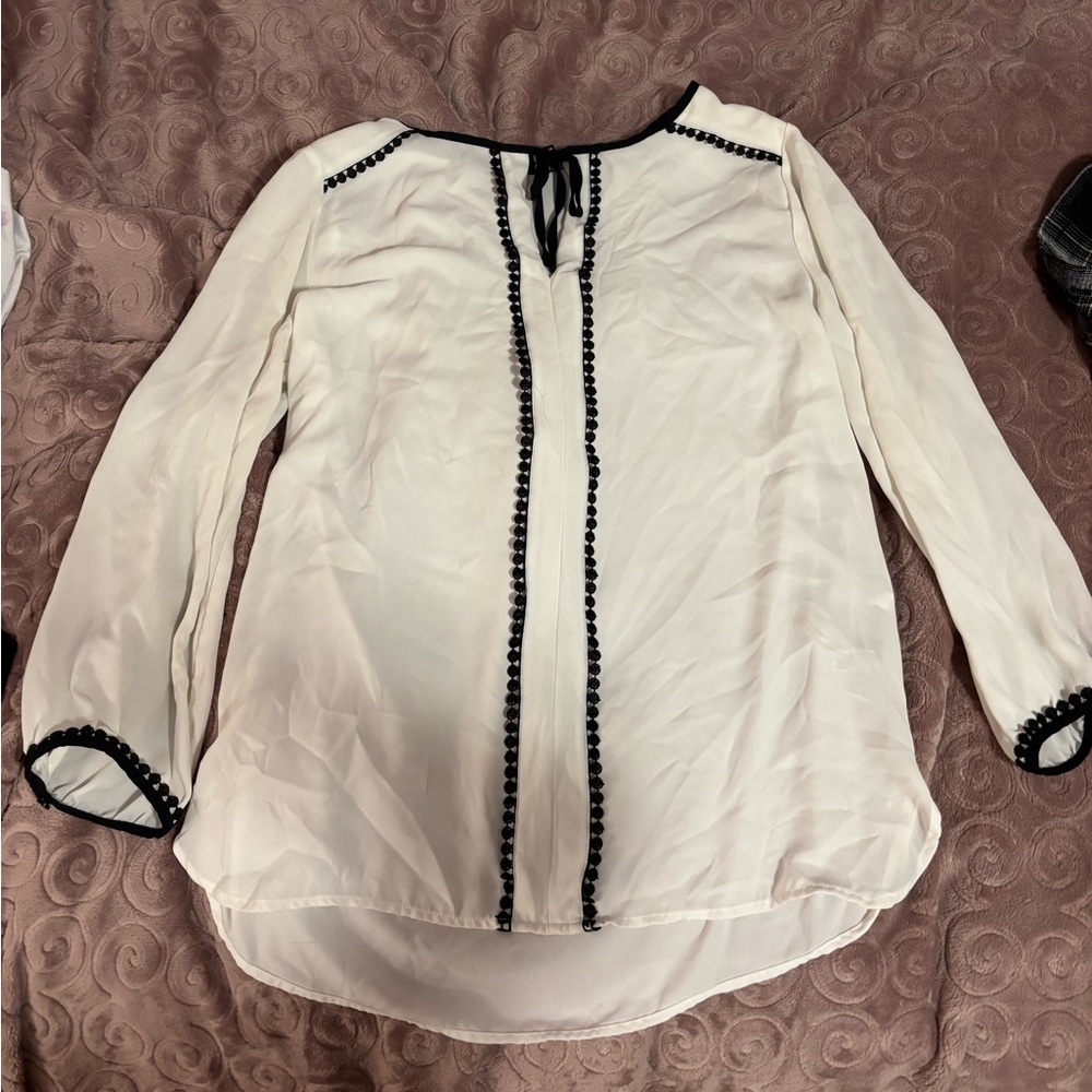 The Limited long sleeved peasant blouse with black trim
